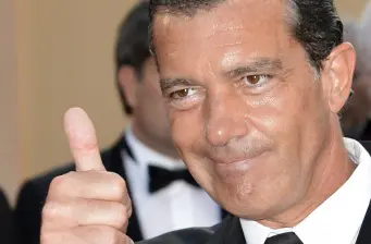 Antonio Banderas close-up giving a thumbs-up gesture