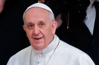 Headshot of Pope Francis in white papal robes and skullcap
