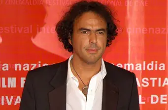 Director Alejandro Iñárritu in black jacket at film event