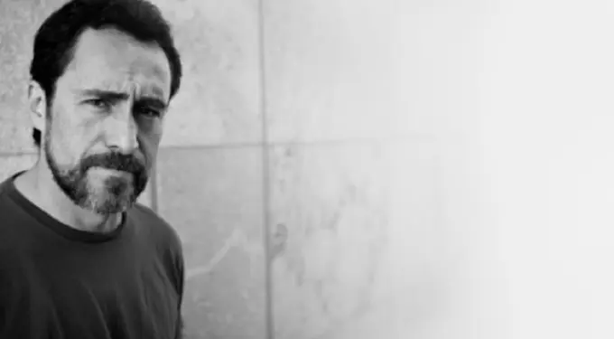 Black and white headshot of Mexican actor Demián Bichir against textured wall