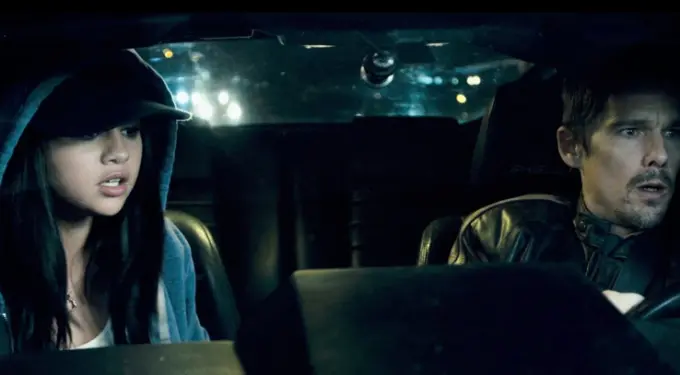 Selena Gomez and Ethan Hawke driving at night in movie scene