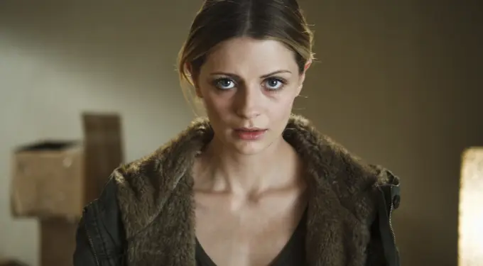 Mischa Barton close-up in fur-lined coat looking directly at camera