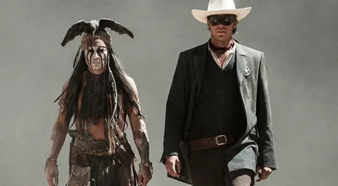 The Lone Ranger in mask and white hat with Tonto in feathered headdress