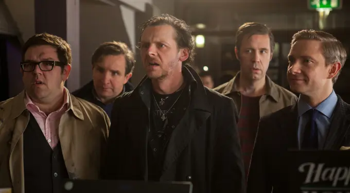 five men in a tense indoor scene from The World's End