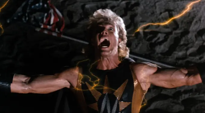 Nuclear Man screaming with arms wide, electricity around him
