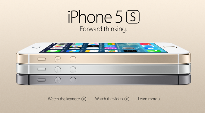 Stack of three iPhone 5S models in gold, silver, and space gray