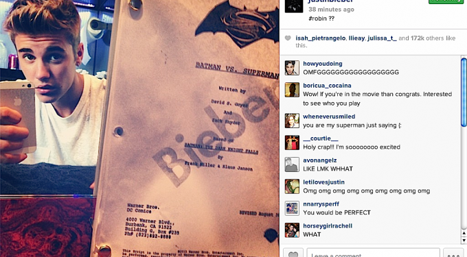 Justin Bieber selfies holding Batman vs. Superman script