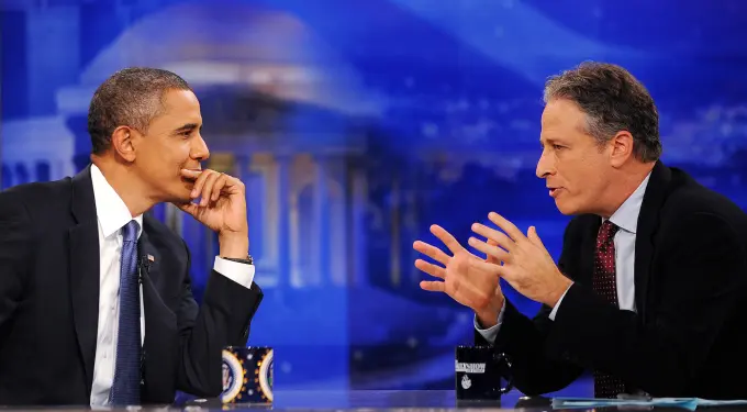 Barack Obama and Jon Stewart in conversation on The Daily Show set