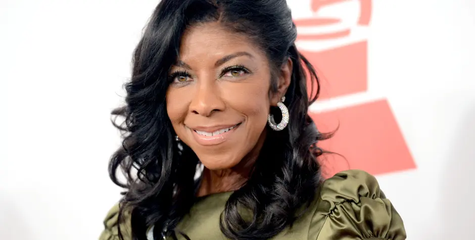 Natalie Cole attends the 2012 Latin Recording Academy Person Of The Year honoring Caetano Veloso.
Close-up of Natalie Cole smiling at event with curly hair