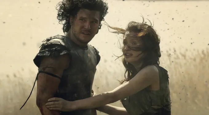 Kit Harington and Emily Browning in dramatic, dusty Pompeii scene