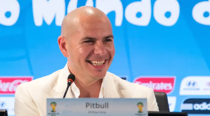 Cuban-American rapper Pitbull smiling at World Cup press conference
