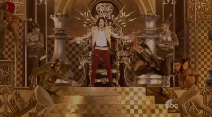 Michael Jackson hologram on throne with dancers performing at awards