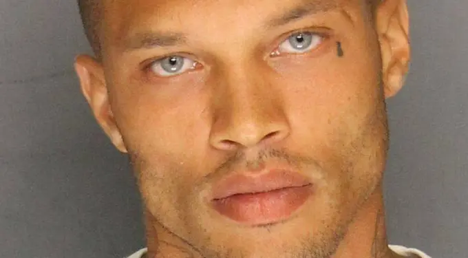 Close-up mugshot of Jeremy Meeks with blue eyes and tattoo near eye
