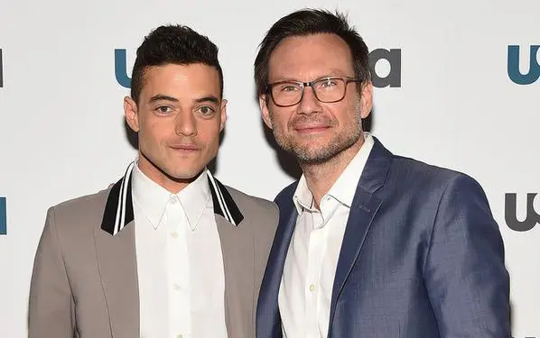 Rami Malek and Christian Slater pose at USA Network event