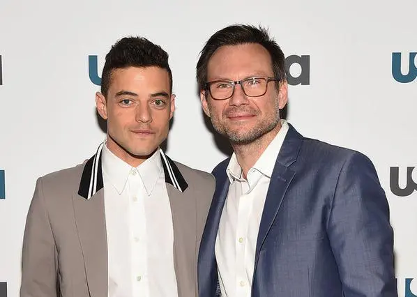 Rami Malek and Christian Slater pose at USA Network event