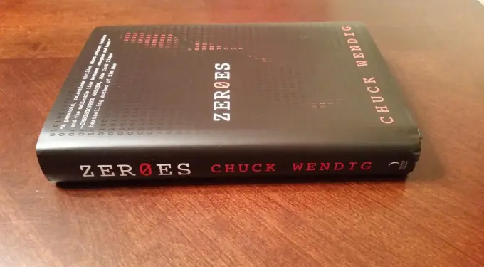 Close-up of Zer0es book by Chuck Wendig on wooden table