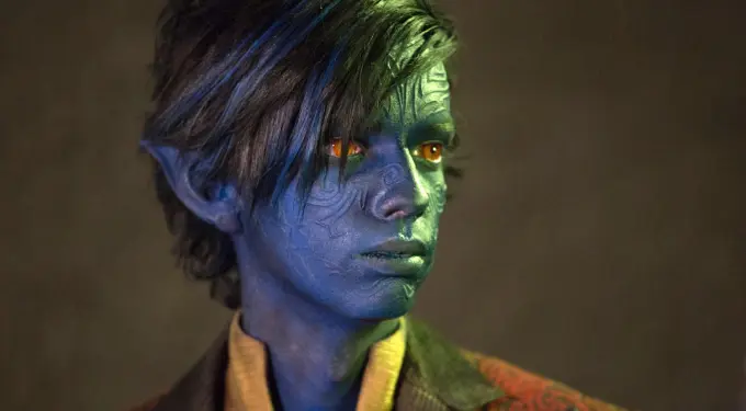 Kodi Smit-McPhee as Nightcrawler with blue skin and orange eyes