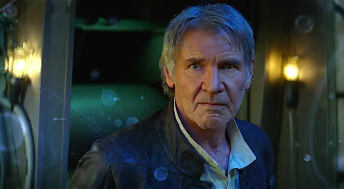 Harrison Ford as Han Solo looking serious in dim light
