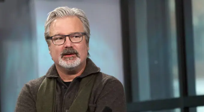 Gore Verbinski in glasses and sweater at an indoor event