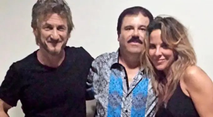 Kate del Castillo and El Chapo pose with a man in a black shirt