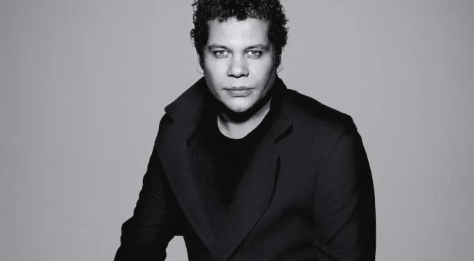 Portrait of Chabuco, Colombian artist blending vallenato with Latin jazz
Black and white headshot of Colombian musician Chabuco facing camera