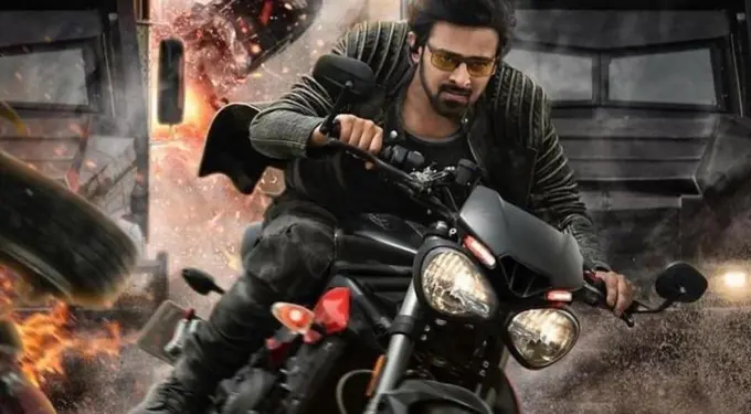 High-speed action sequence featuring a man on motorcycle amid explosion
man riding motorcycle through explosion with flying debris