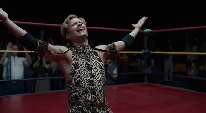 Gael García Bernal as Cassandro, a luchador, in a scene from the film
Gael García Bernal celebrates in wrestling ring wearing leopard print outfit